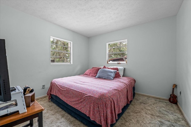 603 Mariposa St, Saint Augustine Beach, FL 32080 - bedroom with carpet and a textured ceiling