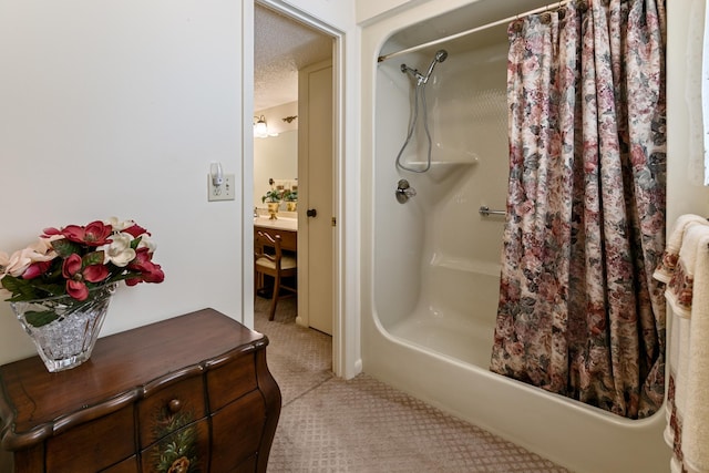 bathroom featuring a textured ceiling