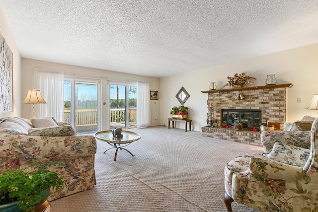 carpeted living room with a fireplace and a textured ceiling