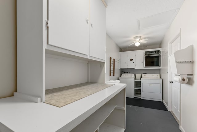 laundry area with washing machine and dryer, ceiling fan, and cabinets