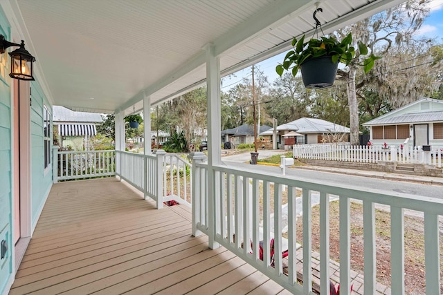 deck with covered porch