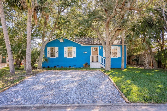 view of front of home with a front lawn