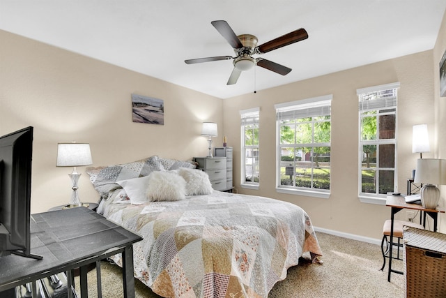 10075 Gate Pkwy Unit 907, Jacksonville, FL 32246 - bedroom featuring baseboards, carpet floors, and ceiling fan