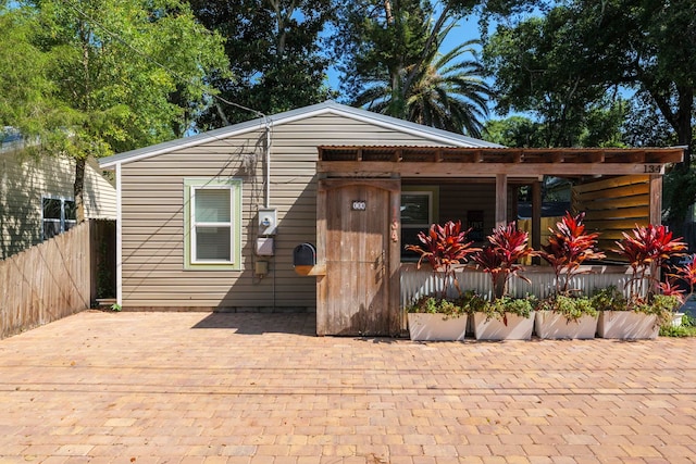 view of front of house with fence