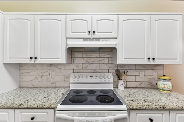 kitchen featuring white cabinets, light stone countertops, white range with electric stovetop, and under cabinet range hood