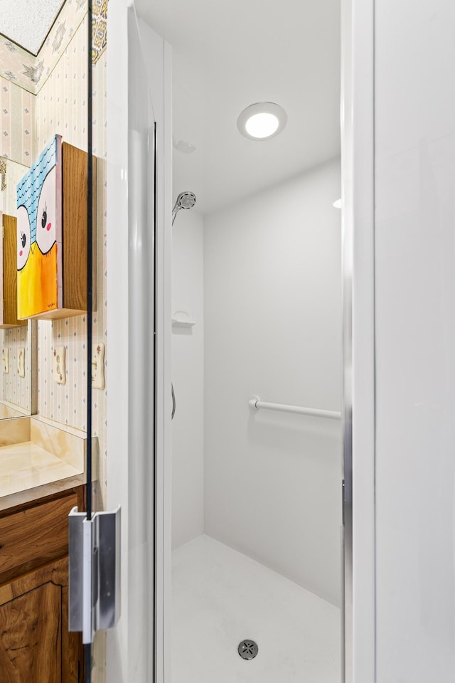 full bath featuring a stall shower
