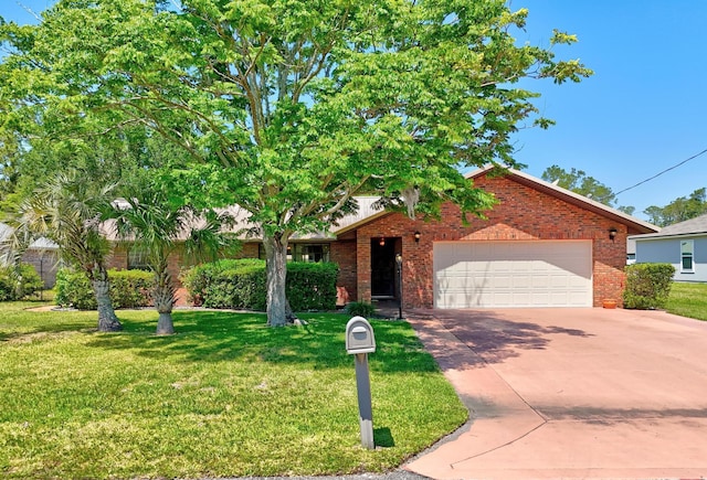 obstructed view of property with brick siding, an attached garage, a front yard, and concrete driveway