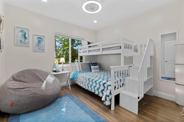 110 Arredondo Ave, Saint Augustine, FL 32080 - bedroom with baseboards, wood finished floors, recessed lighting, and freestanding refrigerator