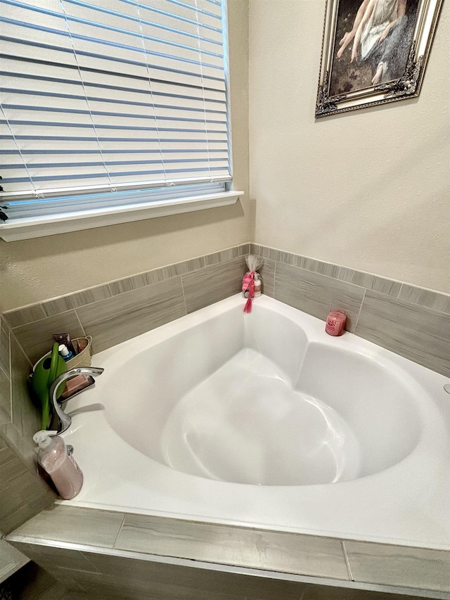 bathroom with a washtub