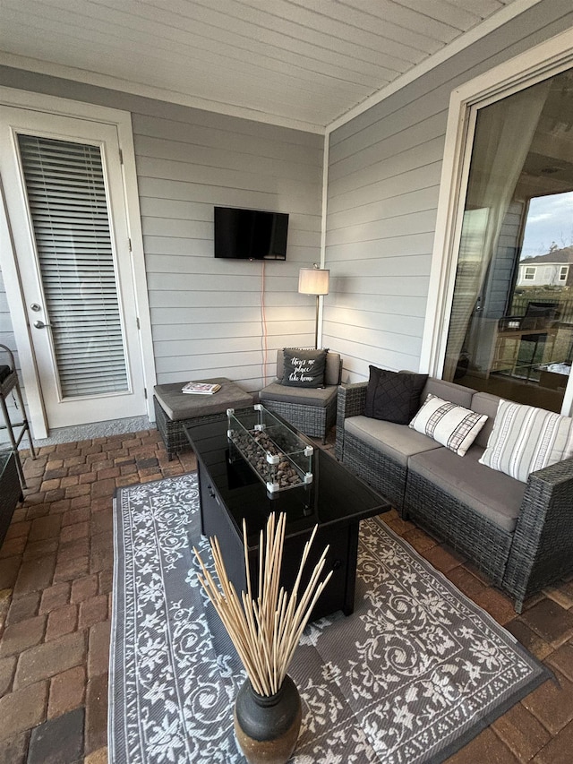 living room with wooden walls