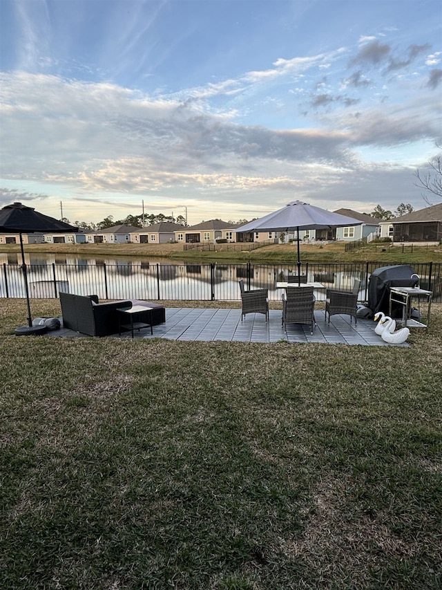 exterior space with a water view