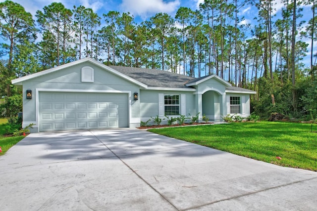 ranch-style house with a garage and a front lawn