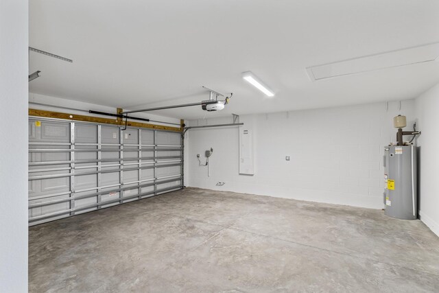 garage featuring electric water heater, electric panel, and a garage door opener