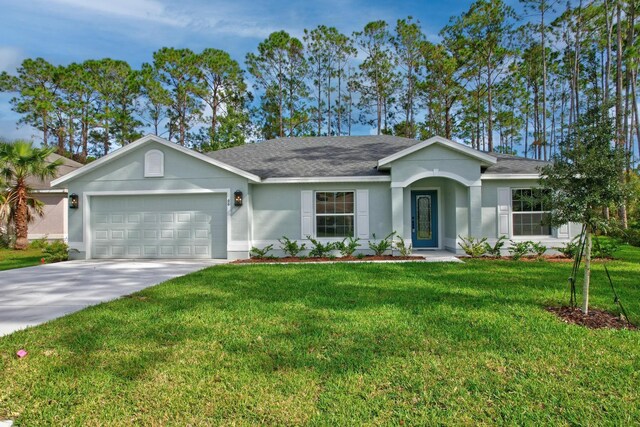 ranch-style home with a garage and a front lawn