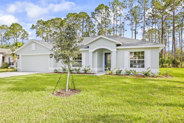 single story home featuring a garage and a front lawn