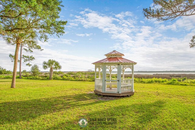 167 Deltona Blvd, Saint Augustine, FL 32086 - view of grassy yard with a gazebo