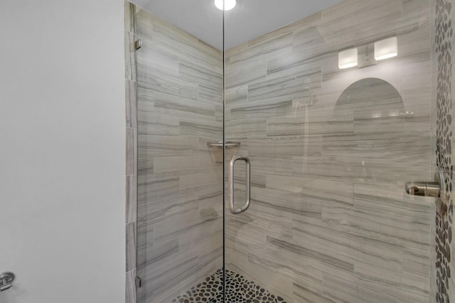 full bathroom featuring a stall shower