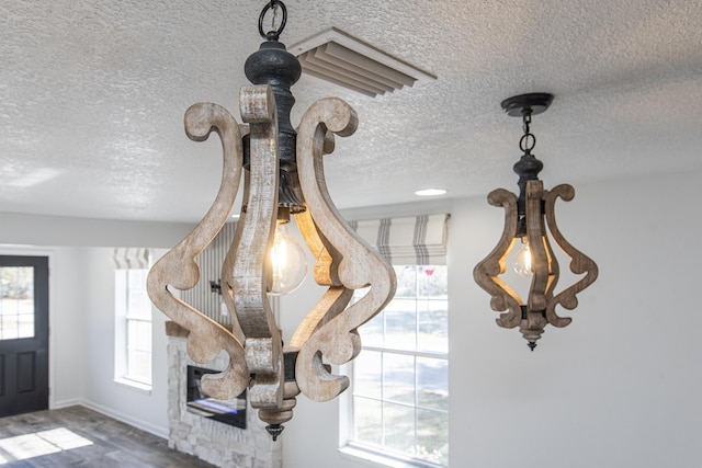 interior details with a textured ceiling