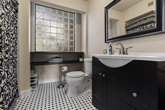 100 Saturn Rd, Saint Augustine, FL 32086 - full bath with vanity, tile patterned flooring, and a shower with curtain