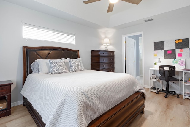 bedroom with light hardwood / wood-style floors and ceiling fan