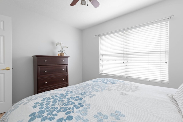 bedroom featuring ceiling fan