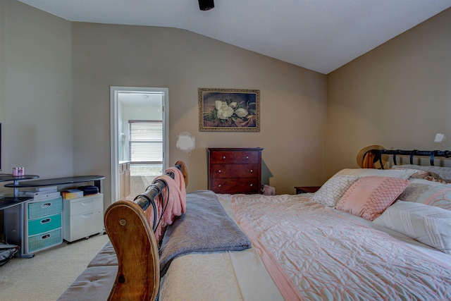 carpeted bedroom featuring lofted ceiling