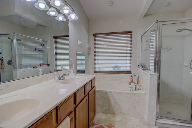 bathroom featuring tile patterned floors, vanity, and separate shower and tub