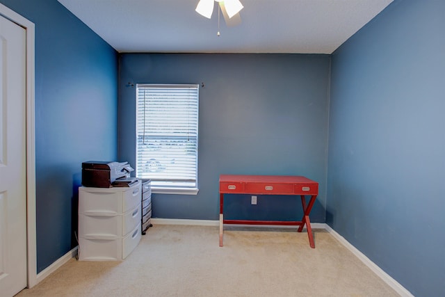 misc room with light colored carpet, a wealth of natural light, and ceiling fan