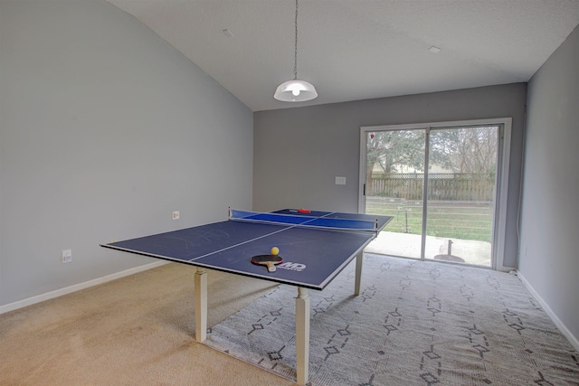 playroom with carpet flooring and lofted ceiling