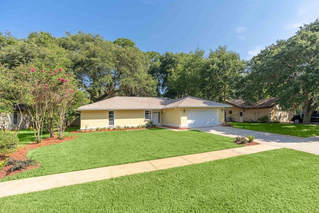 ranch-style home with a garage and a front yard