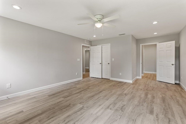 2891 N 8th St, Saint Augustine, FL 32084 - unfurnished bedroom with light wood finished floors, recessed lighting, ceiling fan, and a closet