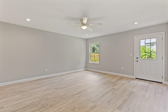 2891 N 8th St, Saint Augustine, FL 32084 - spare room with healthy amount of natural light, a ceiling fan, light wood finished floors, and recessed lighting