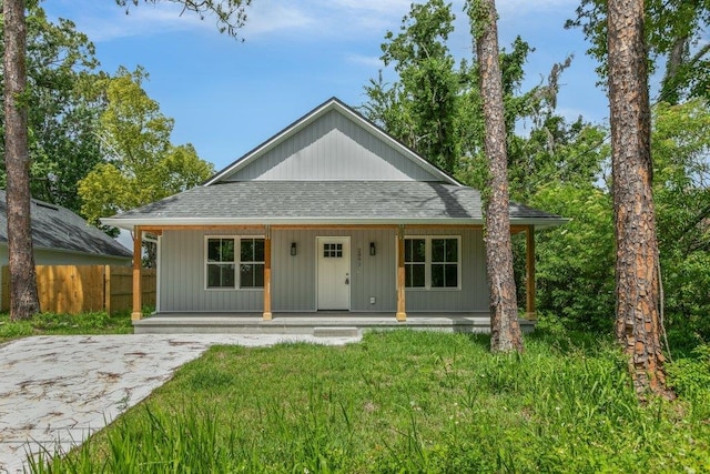 2891 N 8th St, Saint Augustine, FL 32084 - view of front of property with covered porch and a shingled roof