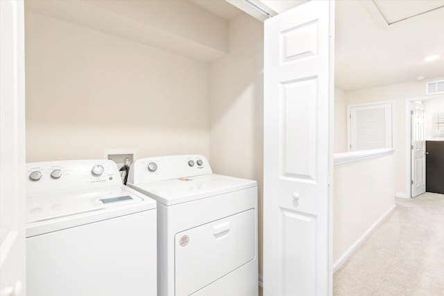 201 Whispering Brook Dr, Saint Augustine, FL 32084 - laundry room featuring independent washer and dryer, light colored carpet, and baseboards