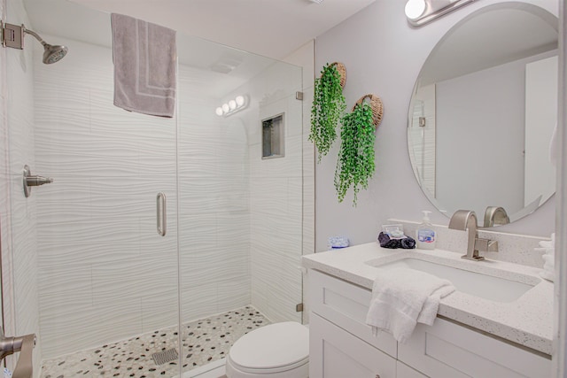 390 A1A Beach Blvd Unit 43, Saint Augustine Beach, FL 32080 - bathroom with toilet, vanity, and a shower stall