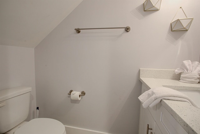390 A1A Beach Blvd Unit 43, Saint Augustine Beach, FL 32080 - half bathroom featuring toilet, vanity, and baseboards