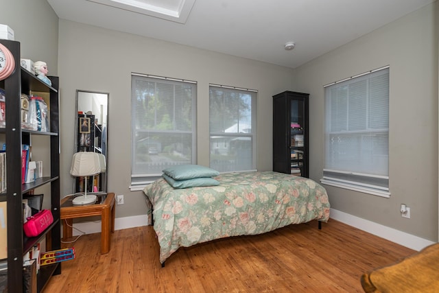 bedroom featuring hardwood / wood-style flooring