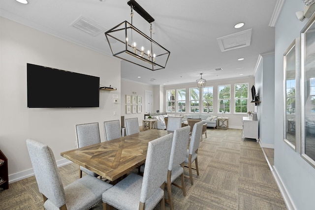 carpeted dining room featuring crown molding