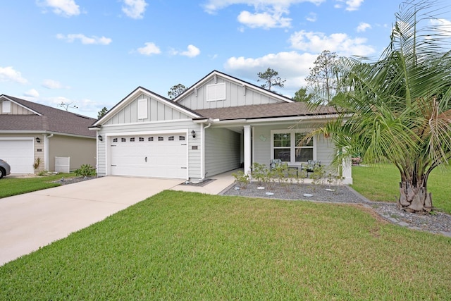 view of front of home featuring a garage and a front yard