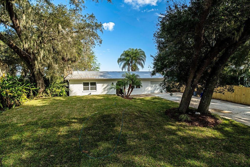 ranch-style house with a front yard