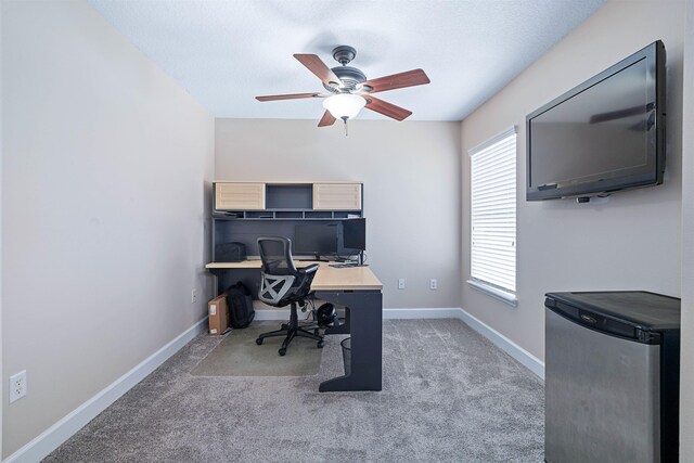 201 N Saxxon Rd, Saint Augustine, FL 32092 - carpeted home office featuring baseboards and a ceiling fan