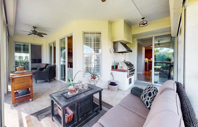 tiled living area featuring ceiling fan