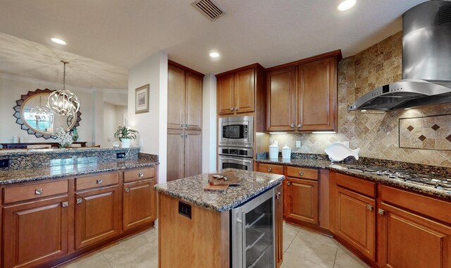 kitchen with visible vents, wine cooler, dark stone countertops, appliances with stainless steel finishes, and wall chimney exhaust hood