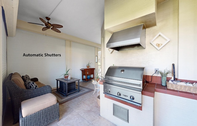 view of patio / terrace featuring grilling area and ceiling fan