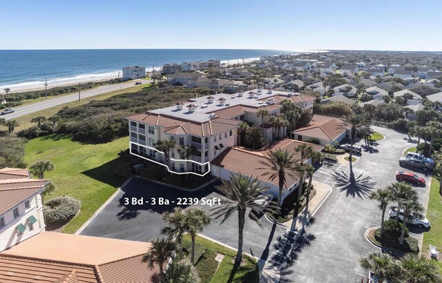 birds eye view of property featuring a residential view and a water view