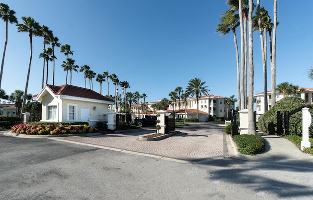 view of street with curbs and a residential view