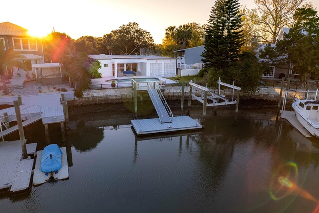 101 Dolphin Dr, Saint Augustine, FL 32080 - view of dock featuring boat lift and a water view
