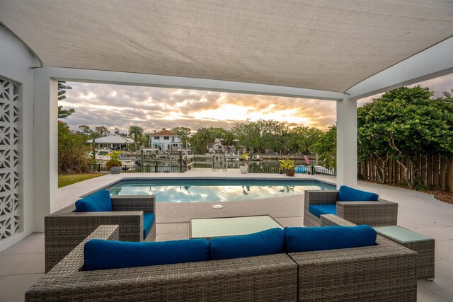 101 Dolphin Dr, Saint Augustine, FL 32080 - view of swimming pool featuring fence, an outdoor living space, a patio area, and a fenced in pool