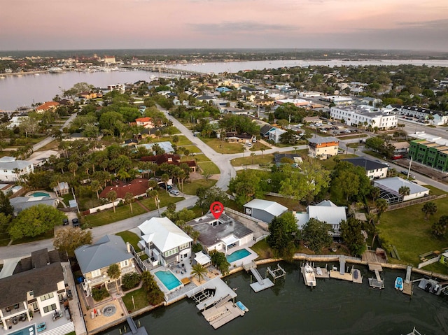 101 Dolphin Dr, Saint Augustine, FL 32080 - aerial view at dusk featuring a water view