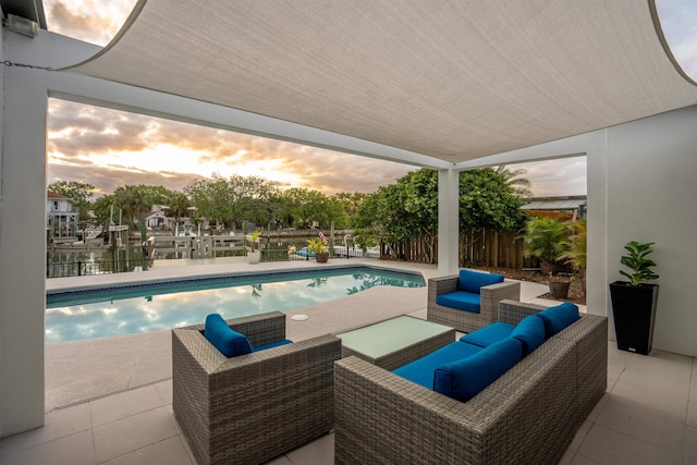 101 Dolphin Dr, Saint Augustine, FL 32080 - view of pool featuring an outdoor living space, fence, a fenced in pool, and a patio area